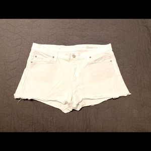 Women’s frayed bottom white jean shorts